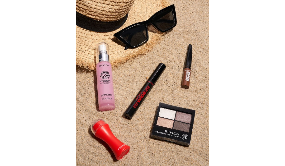 Revlon makeup products in the sand